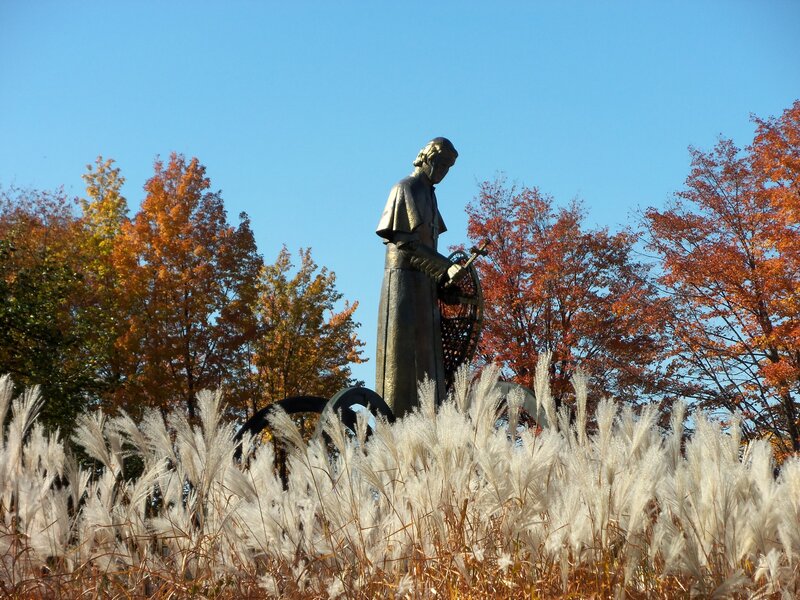 Statue in Autumn Field