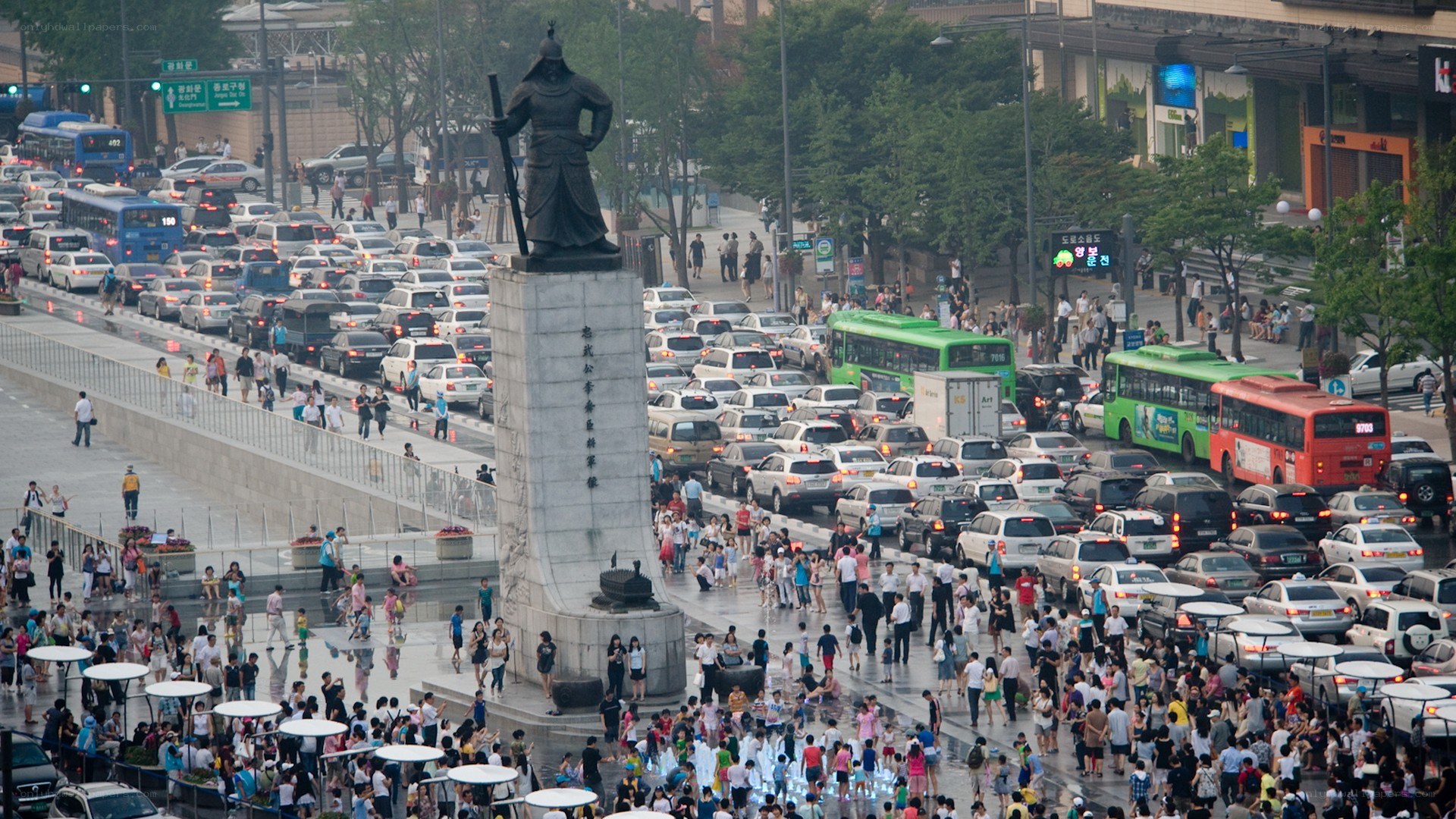 Statue in busy city square