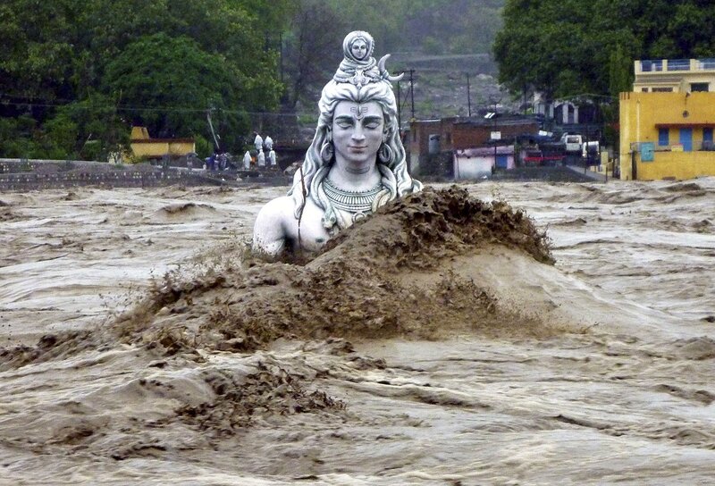 Statue in Floodwaters — Brown