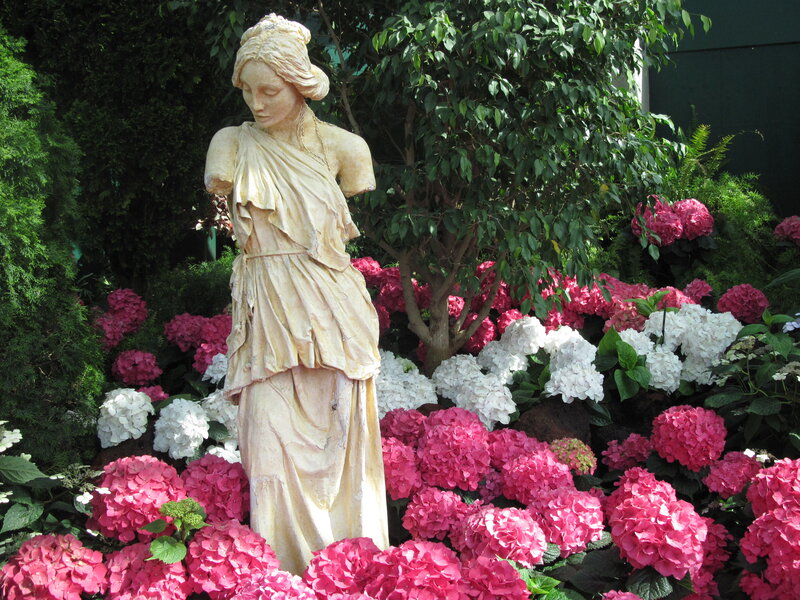 Statue in Flower Garden — Pink