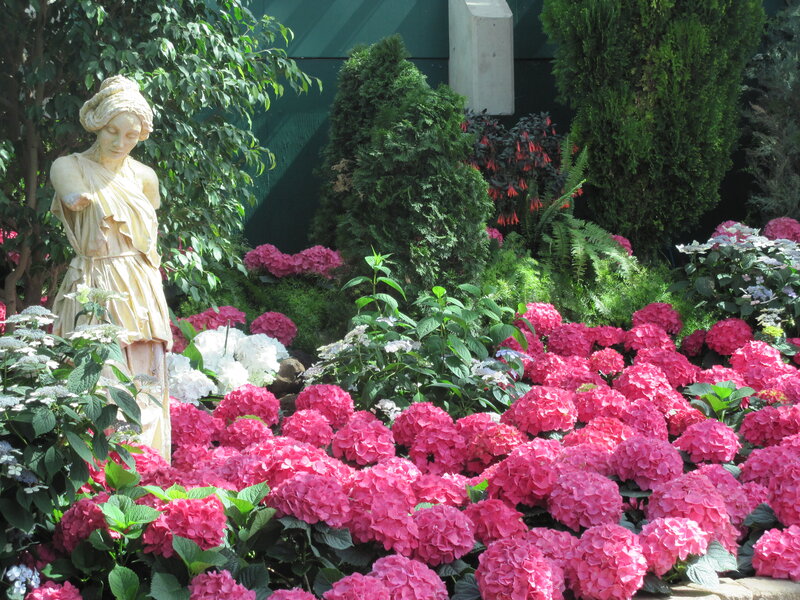 Statue in Flower Garden