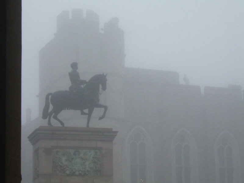 statue in foggy weather