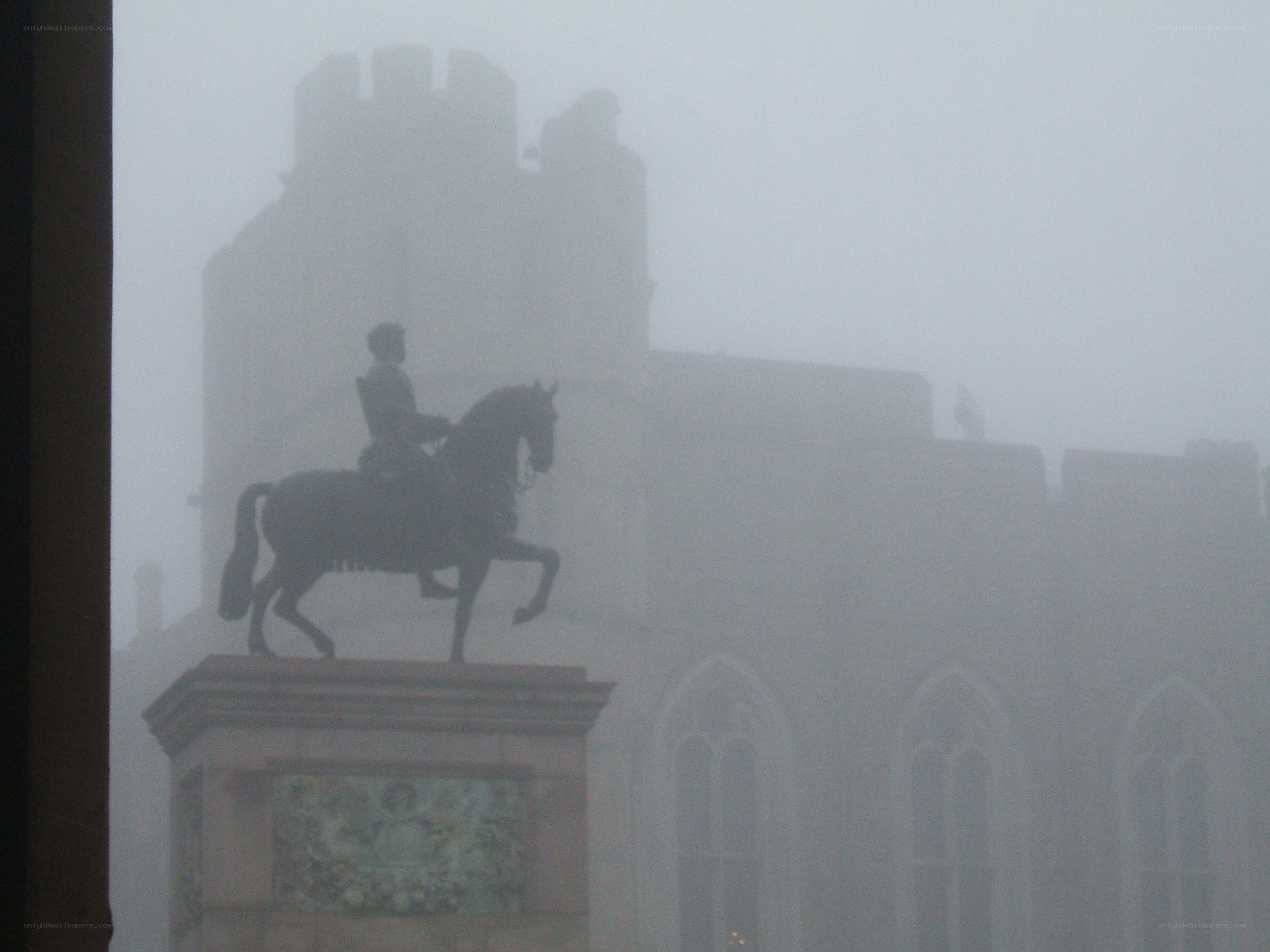 statue in foggy weather
