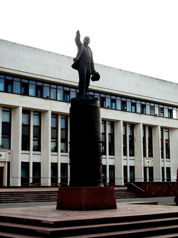 statue in front of building