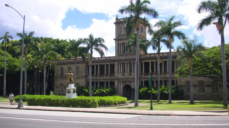 Statue in Front of Building — Green