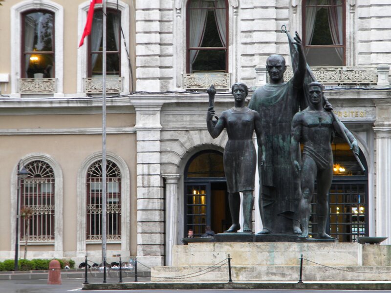statue in front of university building