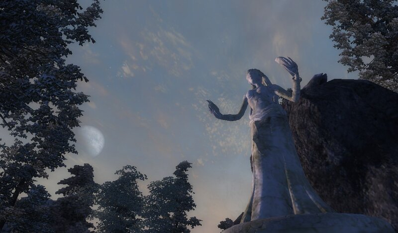 statue in snowy forest