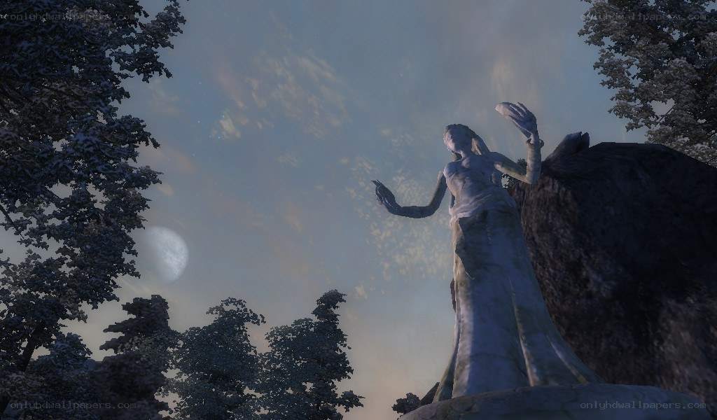 statue in snowy forest