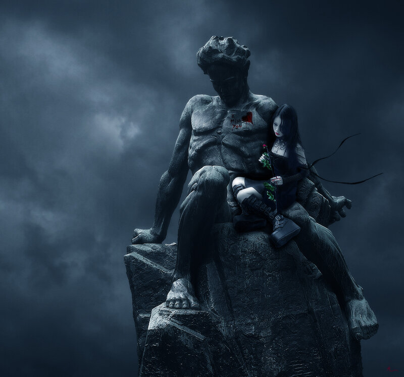 statue of a couple in dark setting