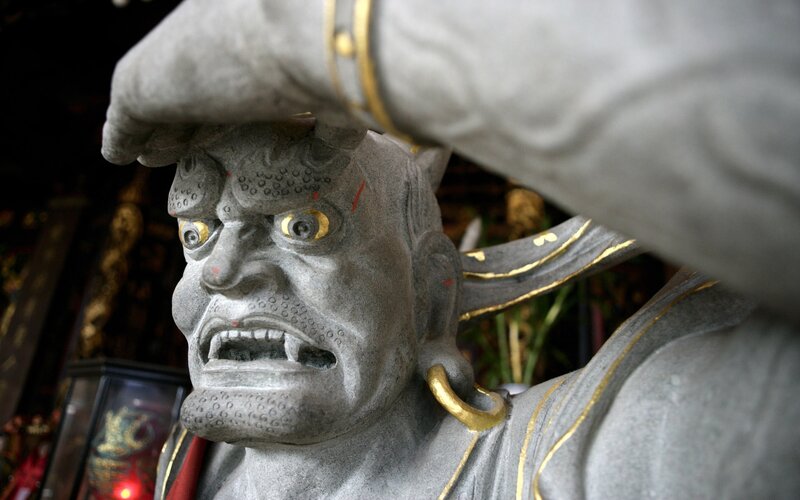 statue of a fierce guardian deity
