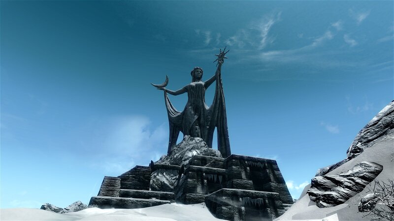 statue of a goddess in snow