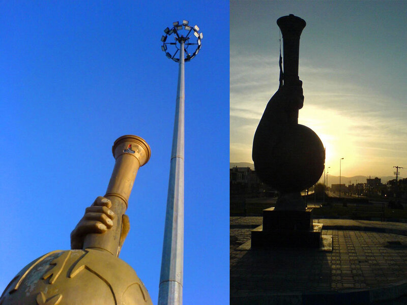 Statue of a hand holding a lamp