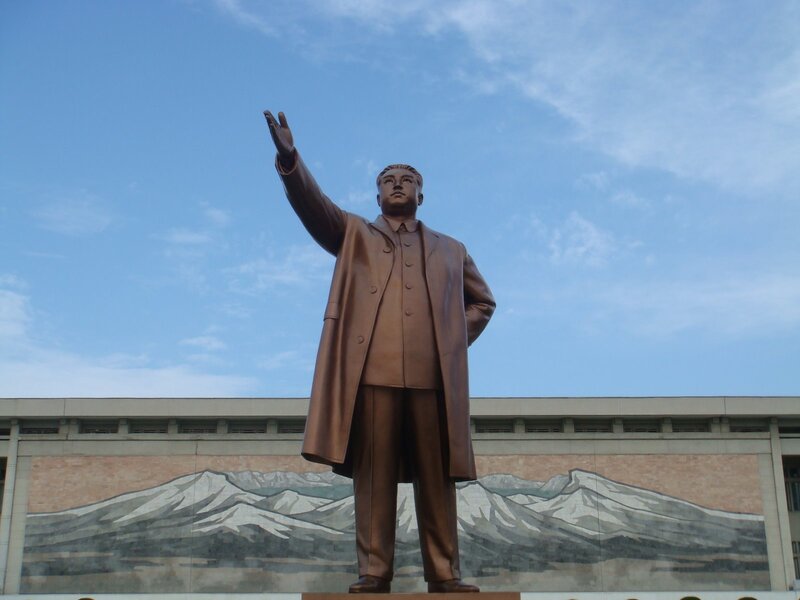 Statue of a man in a coat