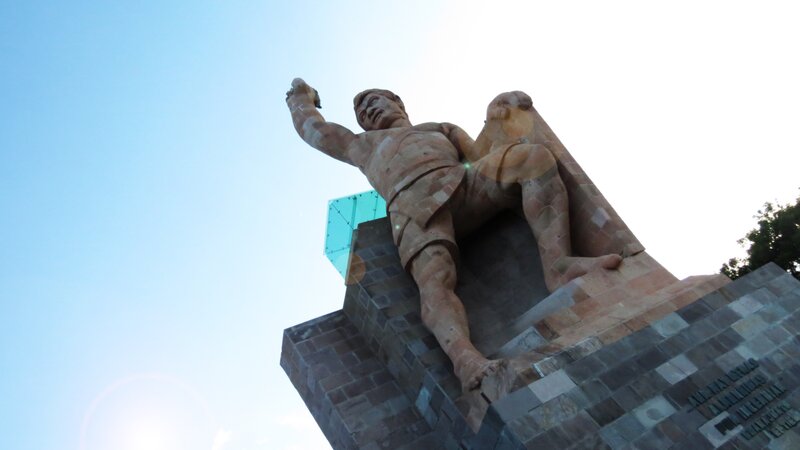 statue of a man on a pedestal