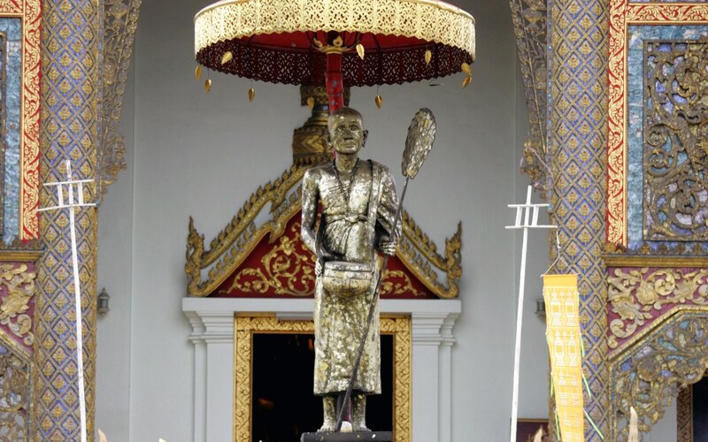 Statue of a monk at a temple