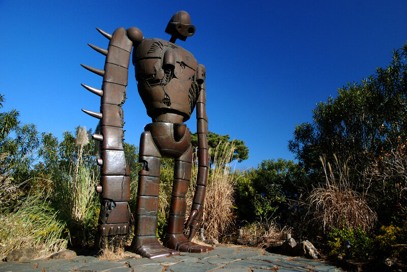 Statue of a robot in a garden
