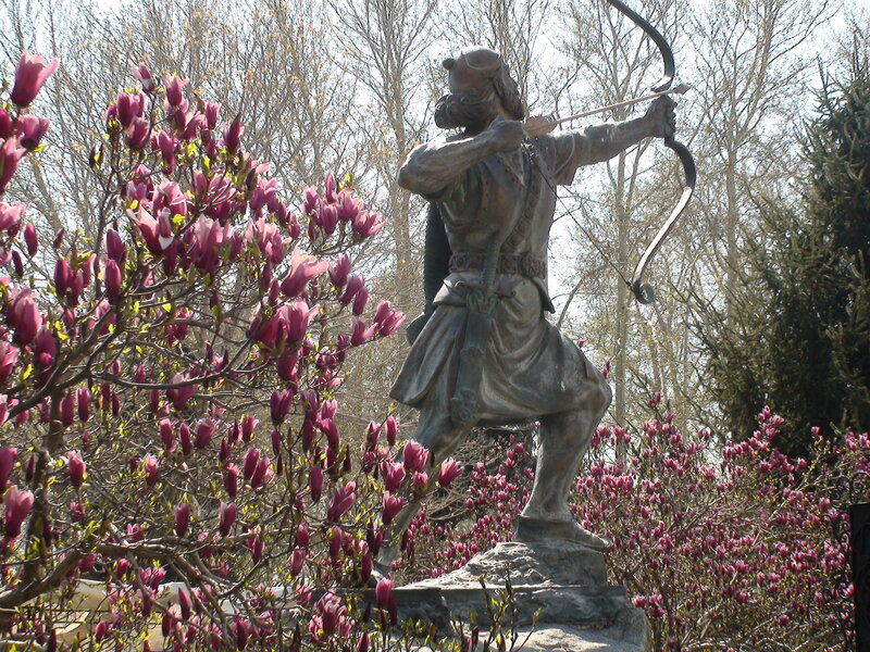 statue of archer in garden