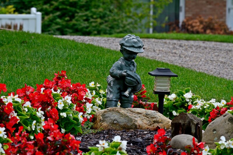 Statue of Boy in Garden