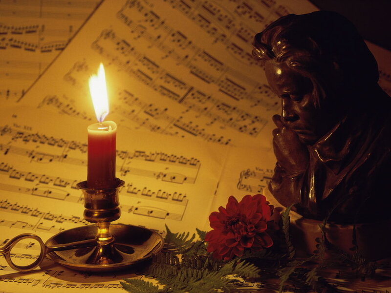 Statue of Composer with Candle