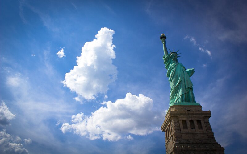 Statue of Liberty against blue sky