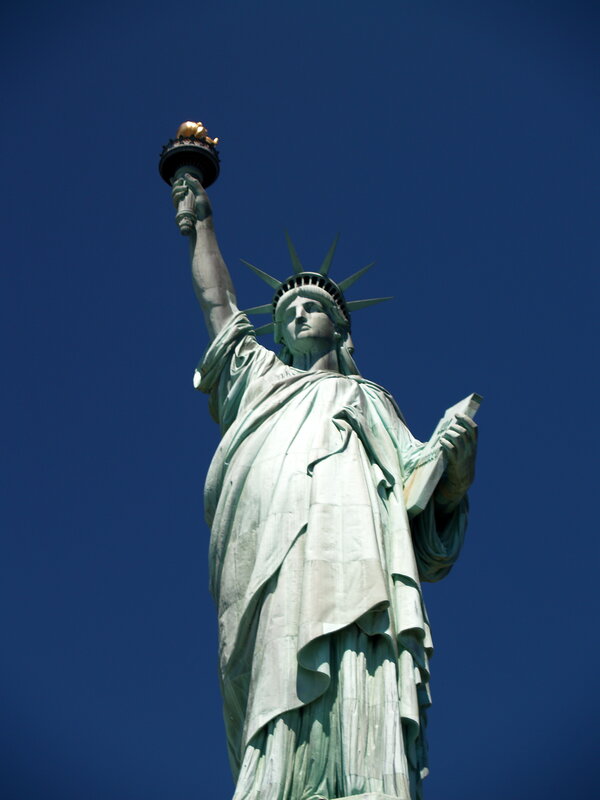Statue of Liberty against blue sky