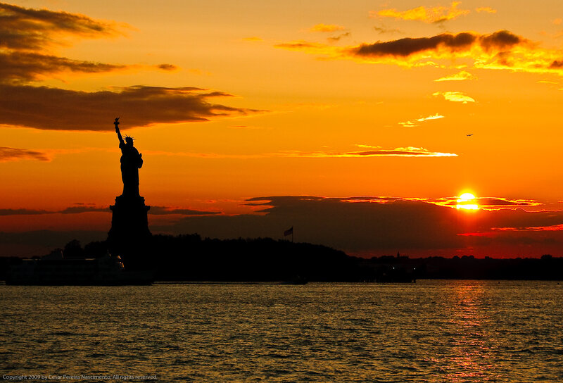 Statue of Liberty at Sunset — Orange, Dramatic