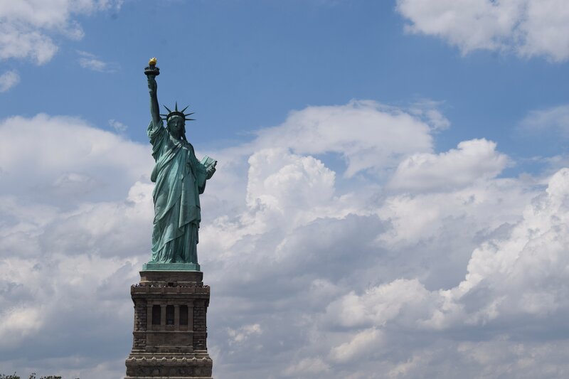Statue of Liberty — Blue, Dramatic, Afternoon, Photograph, Sky, Clouds, Stone Pedestal