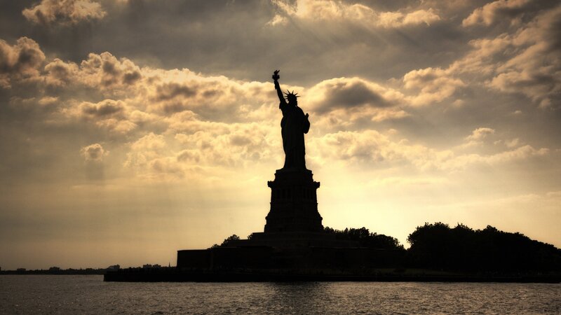 Statue of Liberty Silhouette — Gray, Dramatic, Sunset, Photograph, Clouds