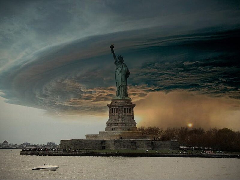 Statue of Liberty under stormy sky