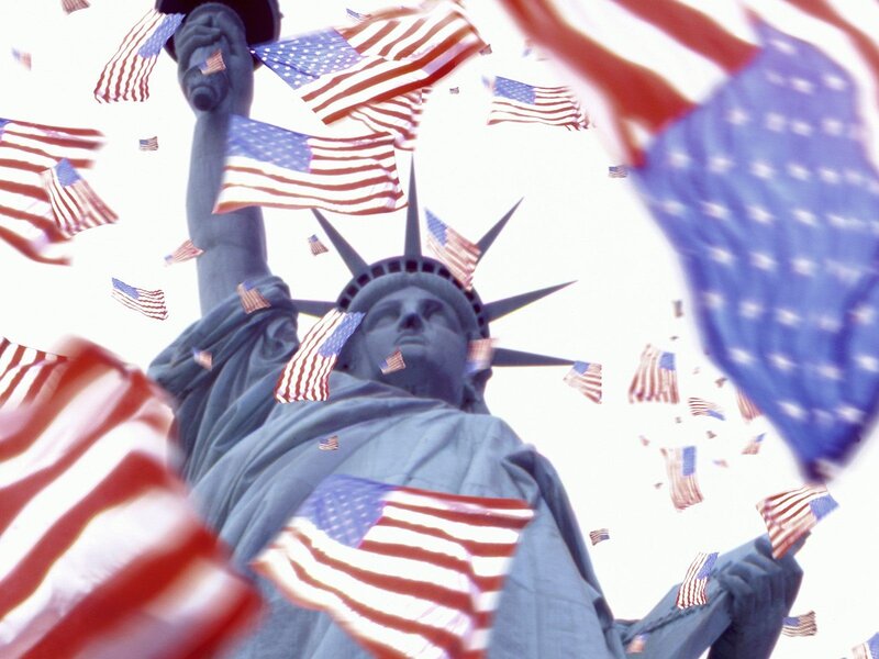 Statue of Liberty with flags