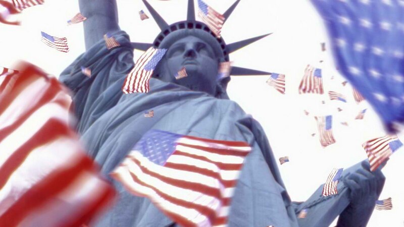 Statue of Liberty with flags