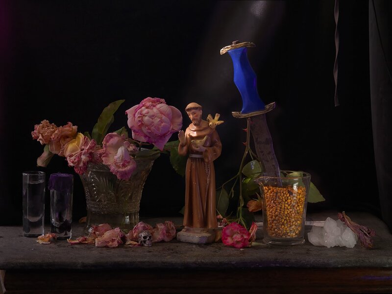 Statue of Saint with Flowers