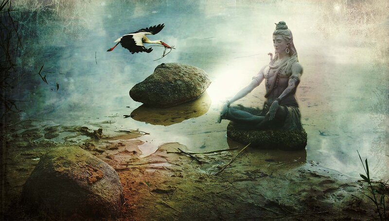Statue of Shiva by a river