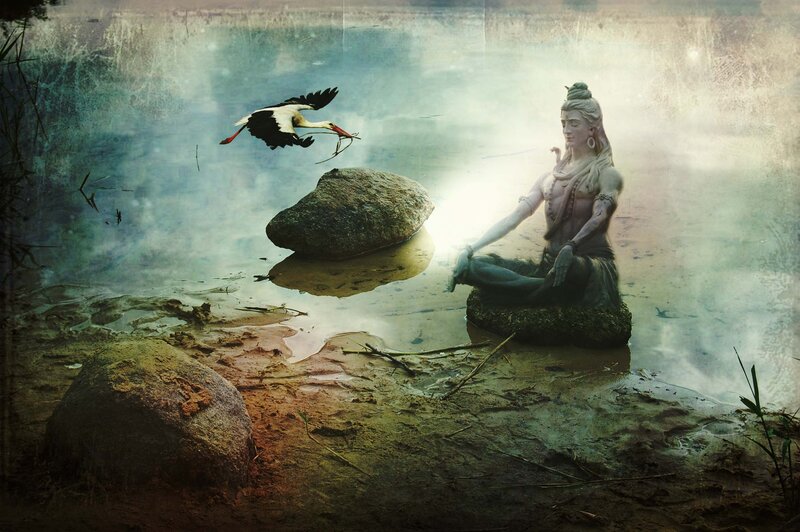 Statue of Shiva by a river