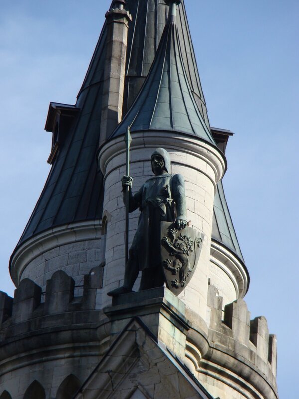 statue on castle tower