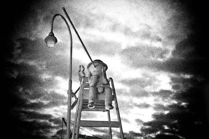 Statue on Ladder