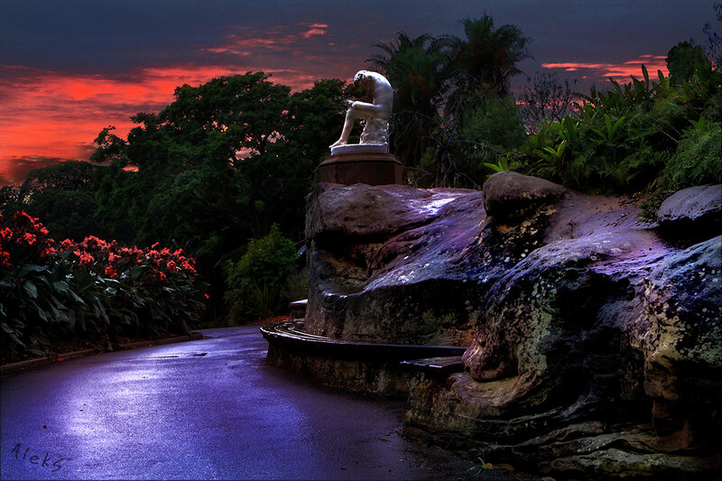 Statue on Rock Formation