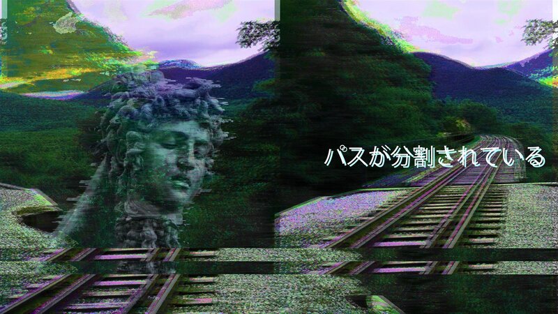 Statue on Train Tracks