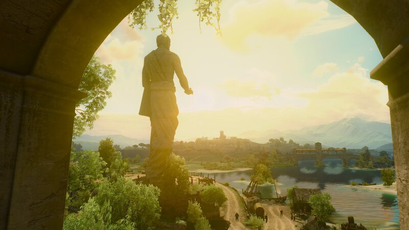 Statue Overlooking River
