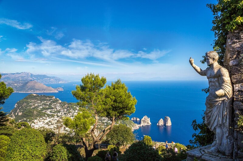 Statue Overlooking Sea — Blue