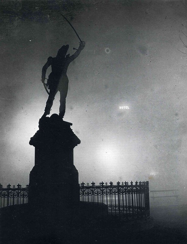 Statue silhouette at night