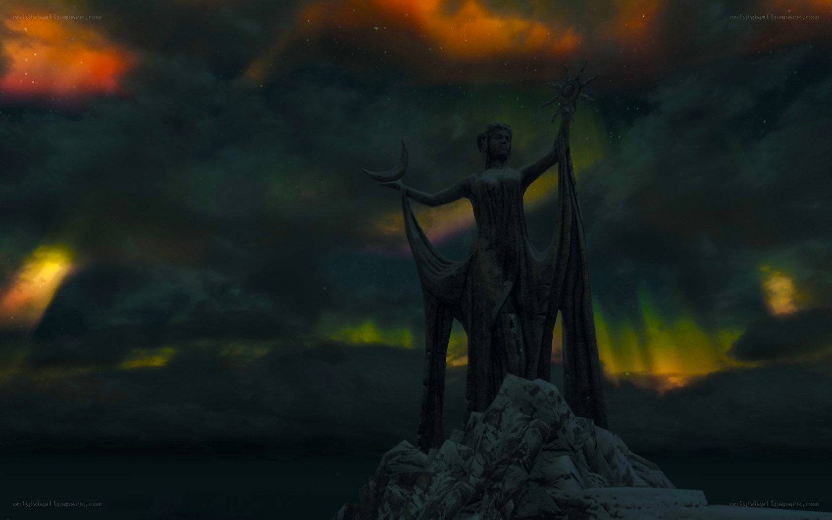 statue under aurora sky