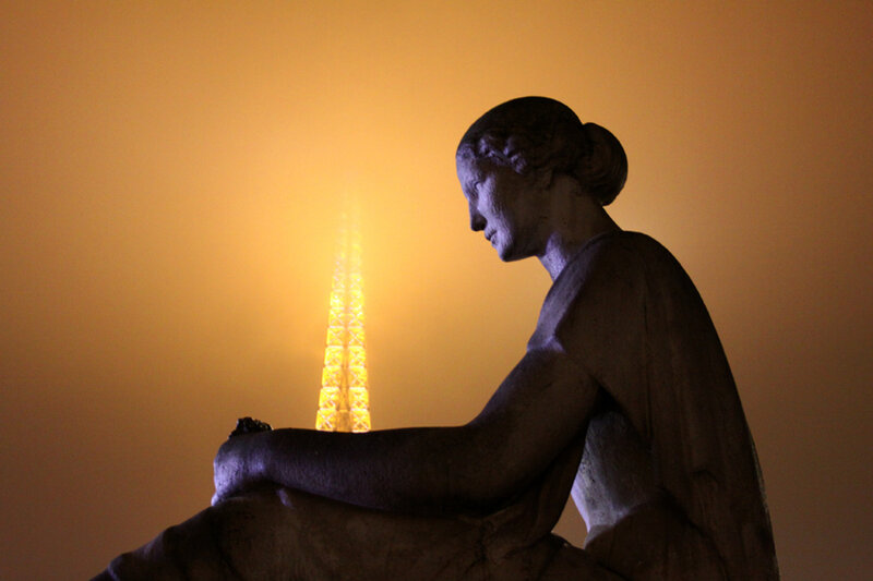 Statue with Eiffel Tower