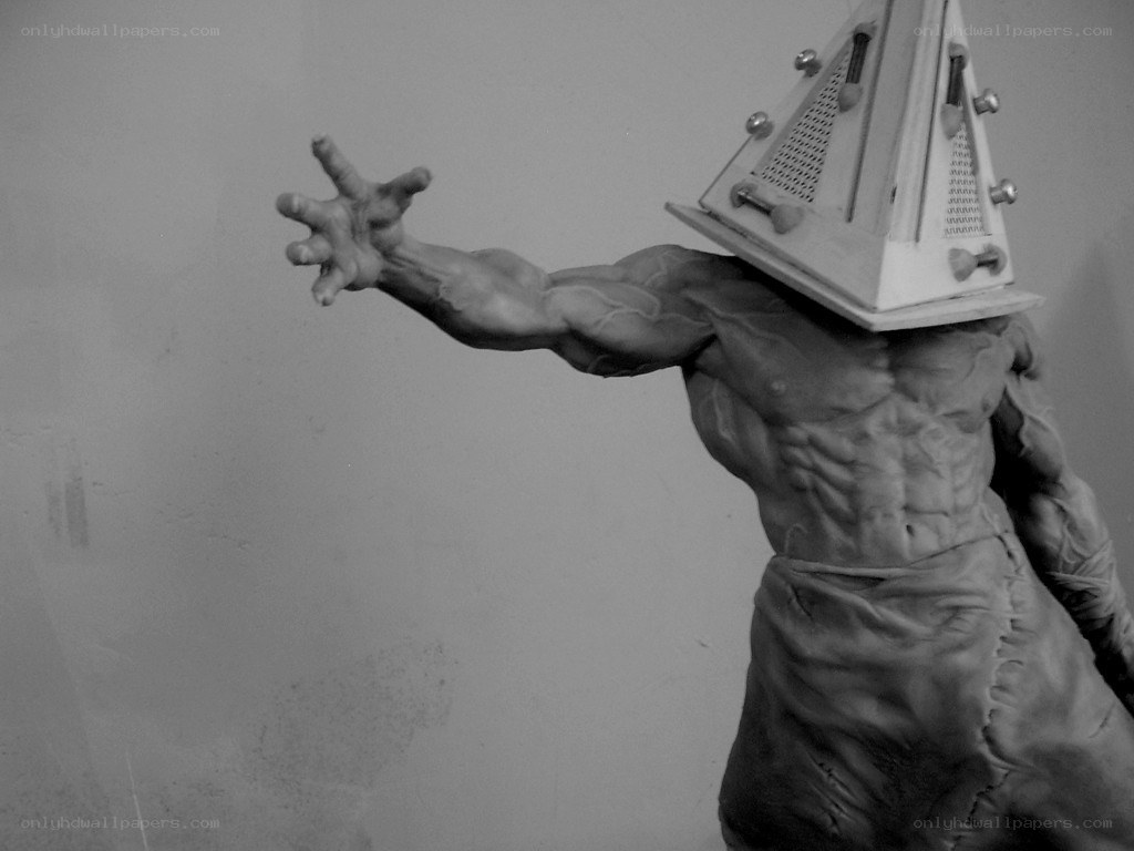 statue with grater head