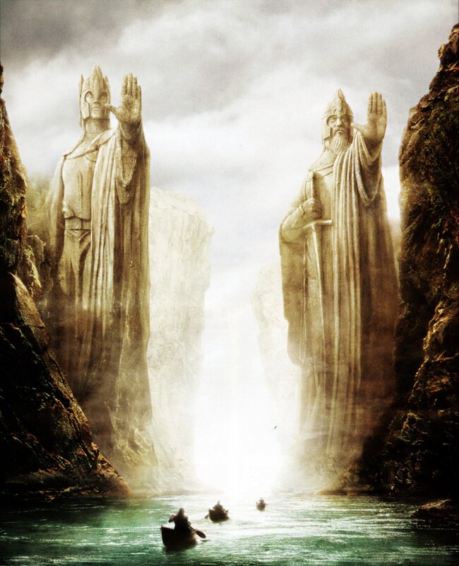 statues guarding a river