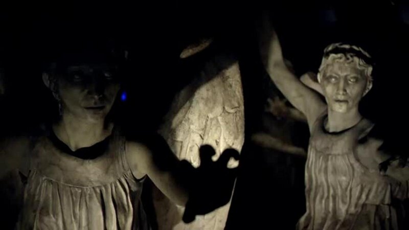 Statues in Dark Room