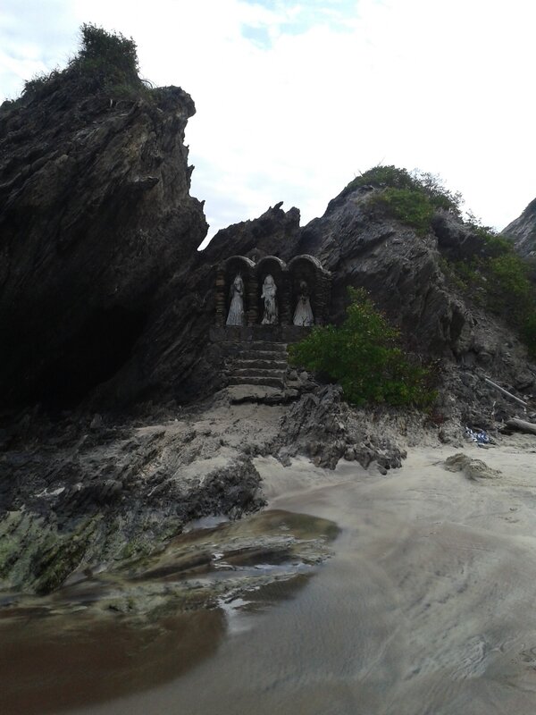 Statues in Rock Niche