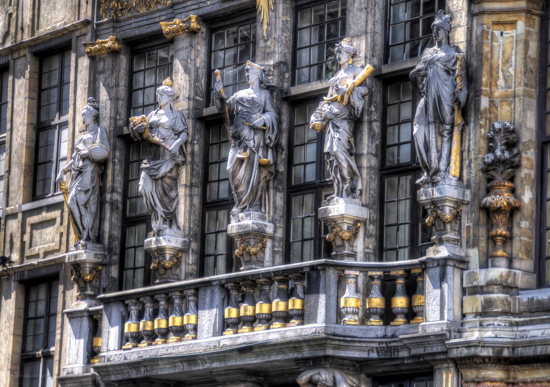 Statues on a historic building facade