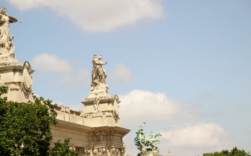 Statues on Building Facade — Blue