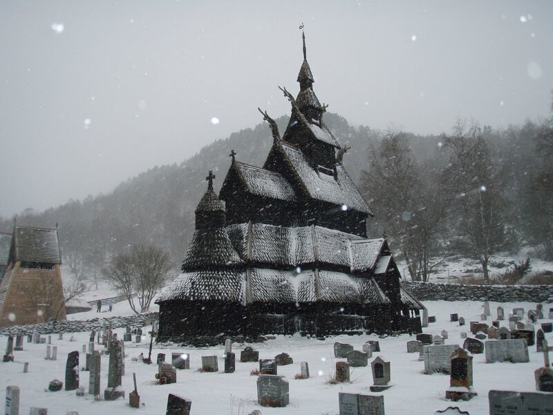 Stave church in snowy landscape